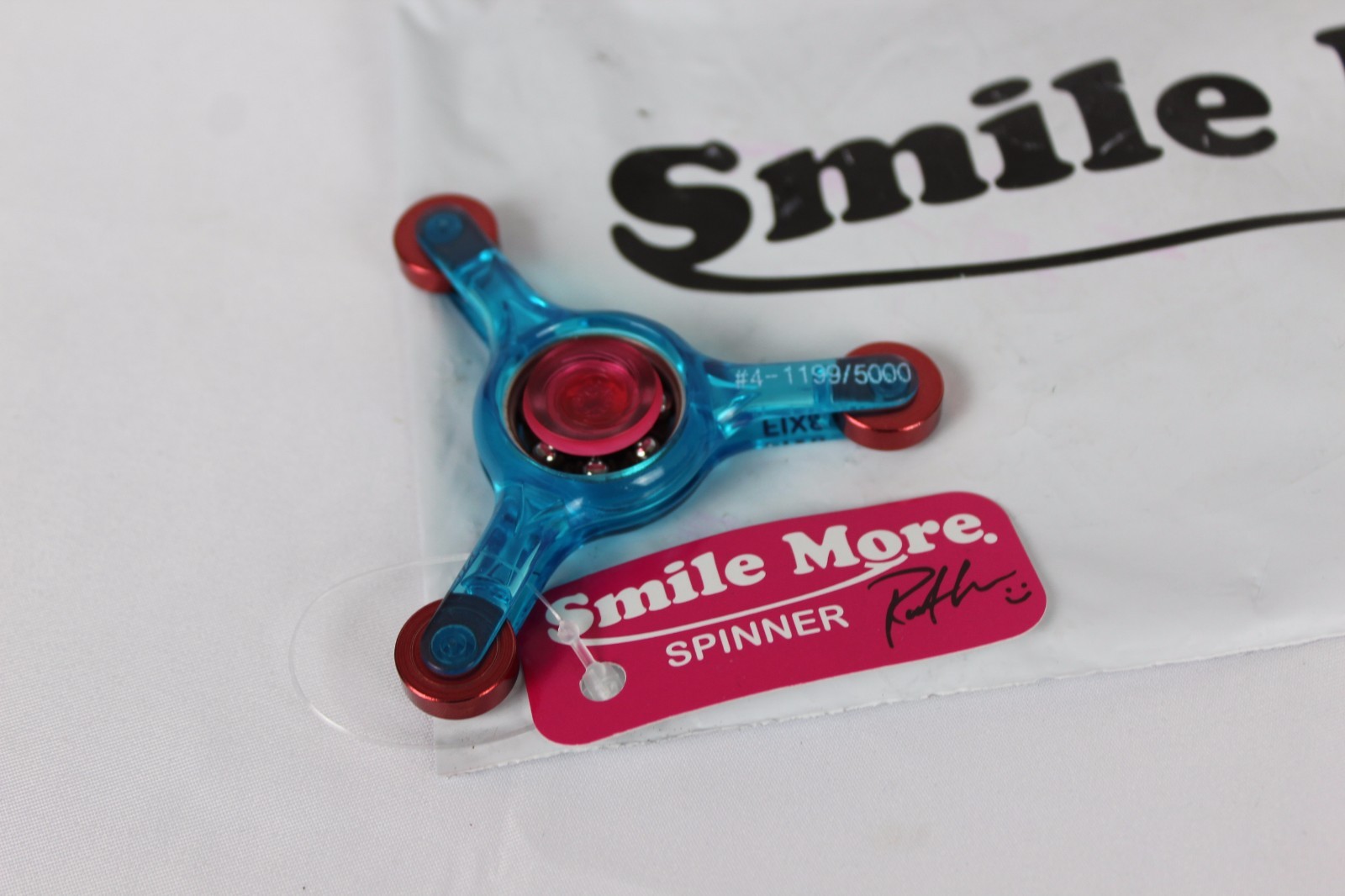 Original Roman Atwood Rare 1199 of 5000 Smile More Blue Fidget Spinner