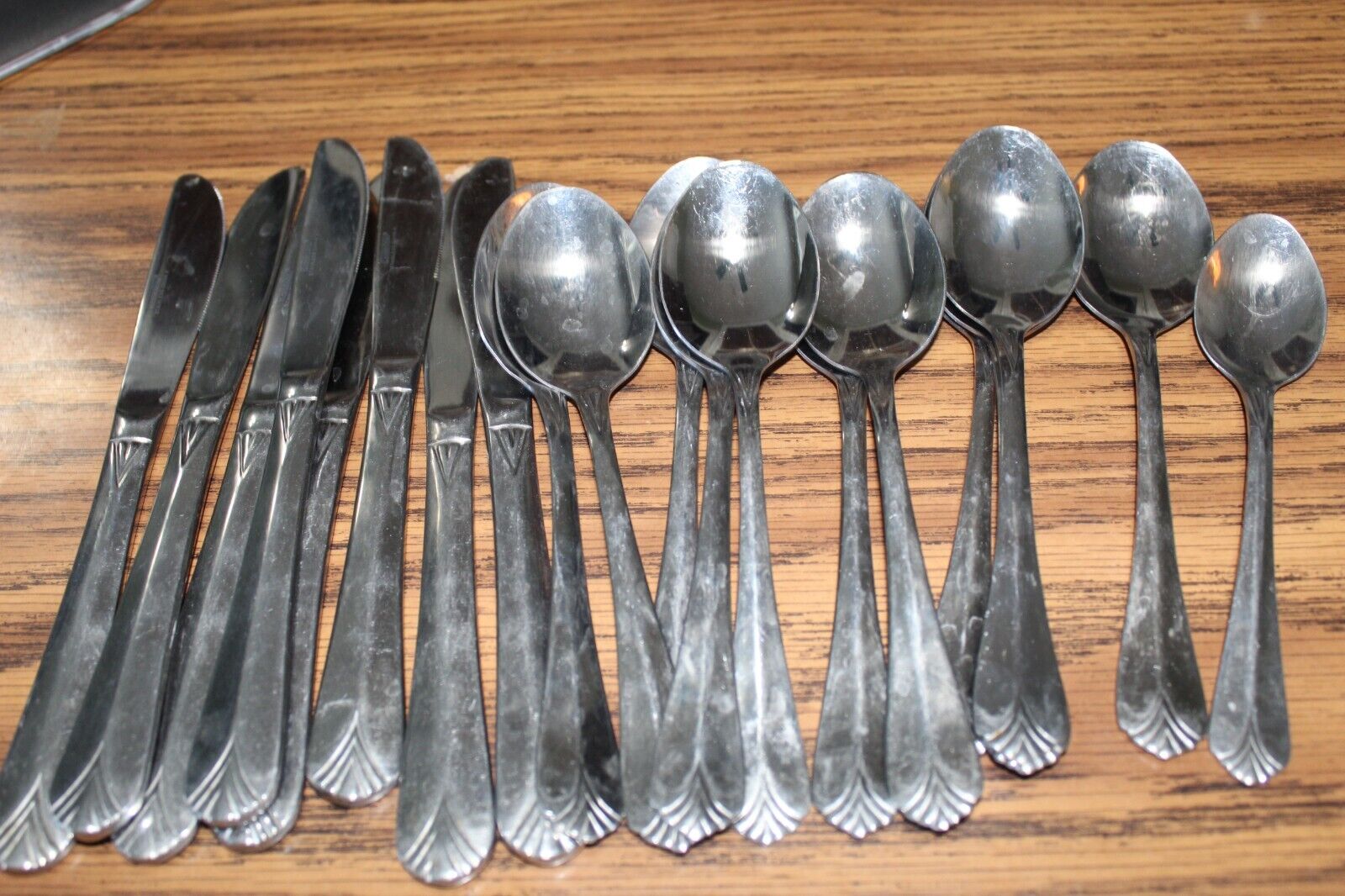 Silverware 12 Spoons 7 Knives