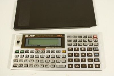SHARP PC1403H, vintage pocket computer/calculator. (ref J 551)