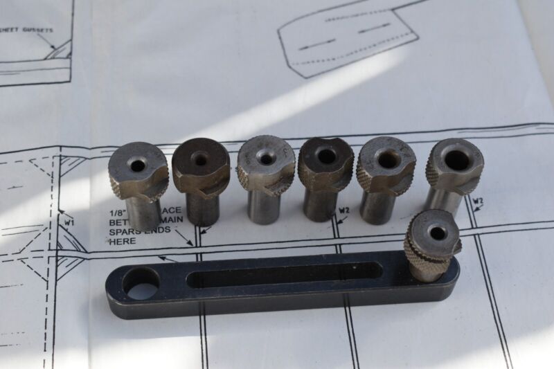 Steel drill guide and 7 slip fit drill bushings, See "Description"