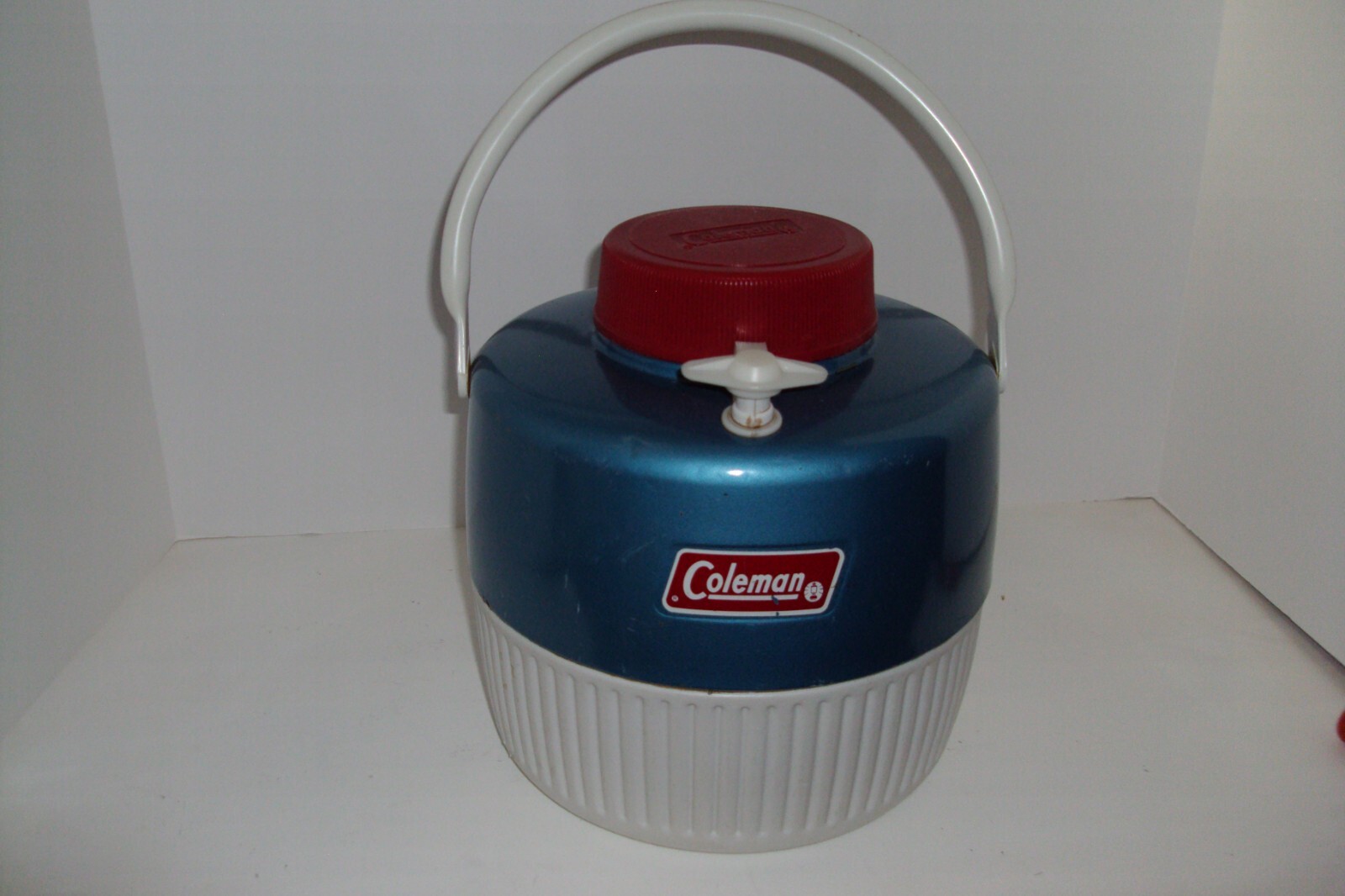 COLEMAN VINTAGE THERMOS, 1 gallon jug with unique colors, sm. dent on rim