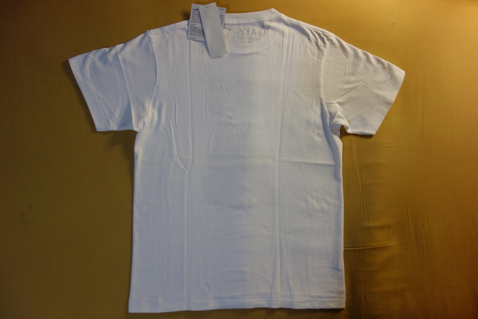 Pre-owned Uniqlo Kaws X  Ut 2016 Short Sleeve Graphic T-shirt "passing Through" White