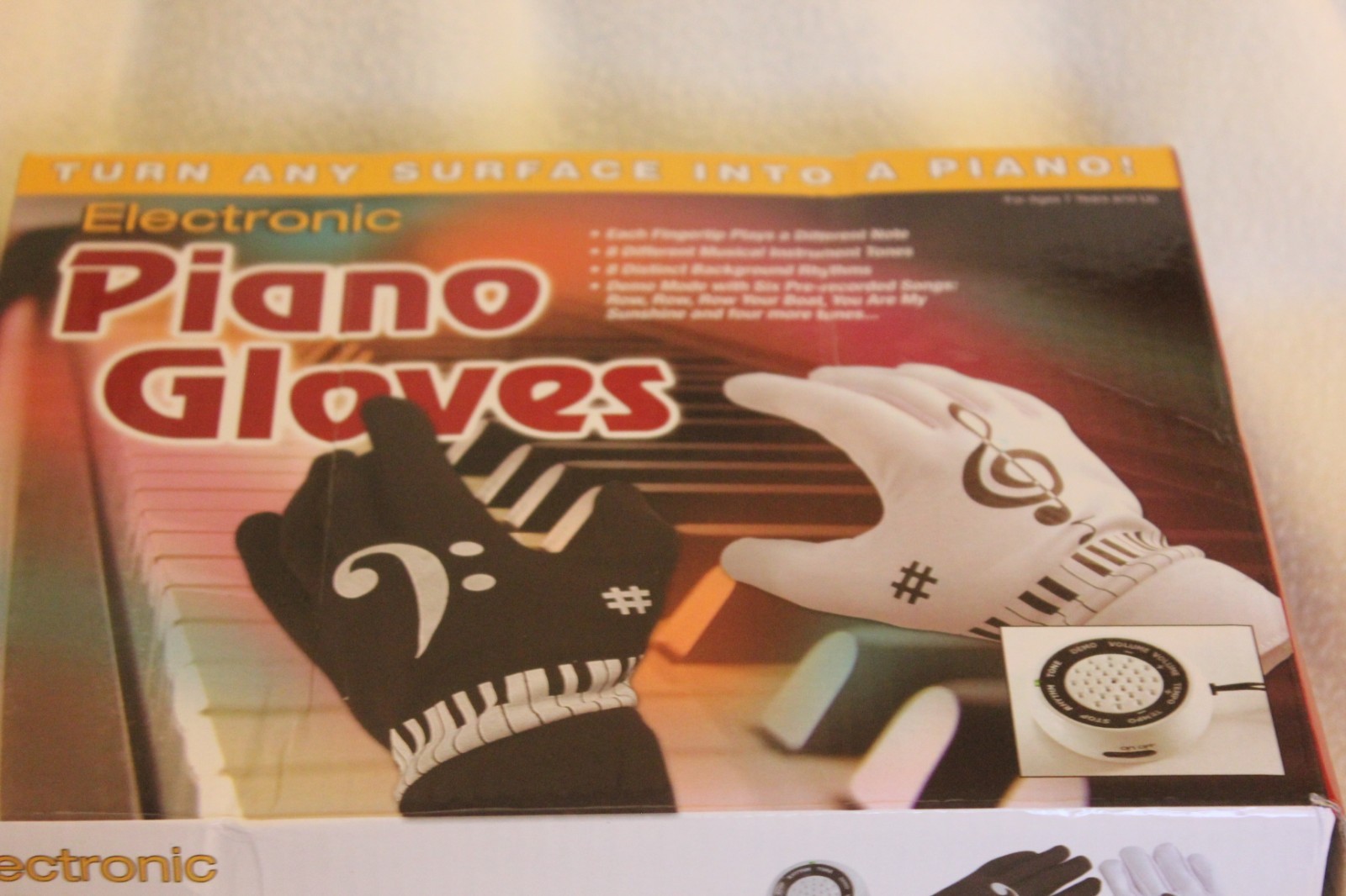 The Tap a Tune Musical Electronic Piano Gloves Converts Any Surface to Keyboard