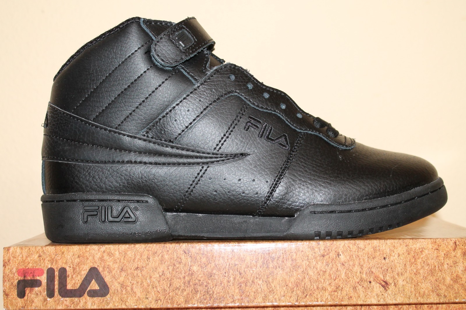 fila f13 mid