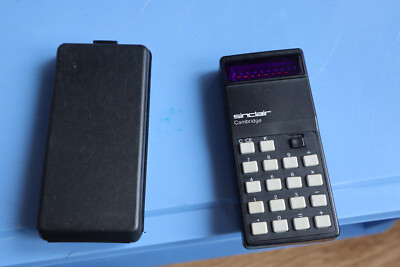 VINTAGE SINCLAIR CAMBRIDGE POCKET CALCULATOR WITH ORIGINAL PLASTIC CASE WORKING