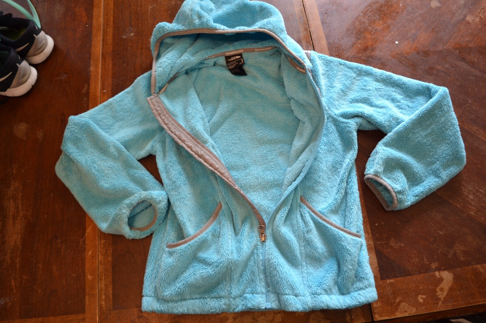 The North Face blue fleece hooded jacket girl's sz M (10/12)