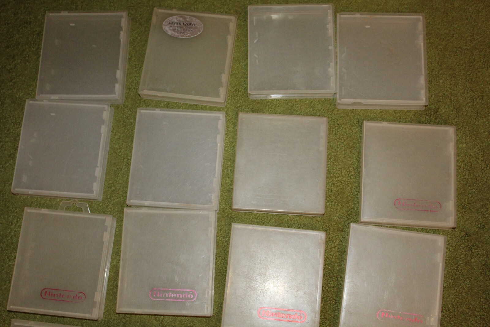 Lot of 22 NES Nintendo official hard plastic clamshell game cases clear rental