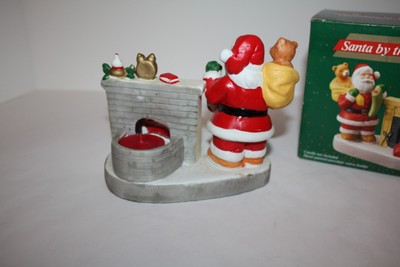 Santa by Fireplace Candle Holder