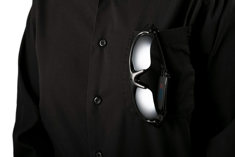 Black shirt with stylish sunglasses hanging from pocket.