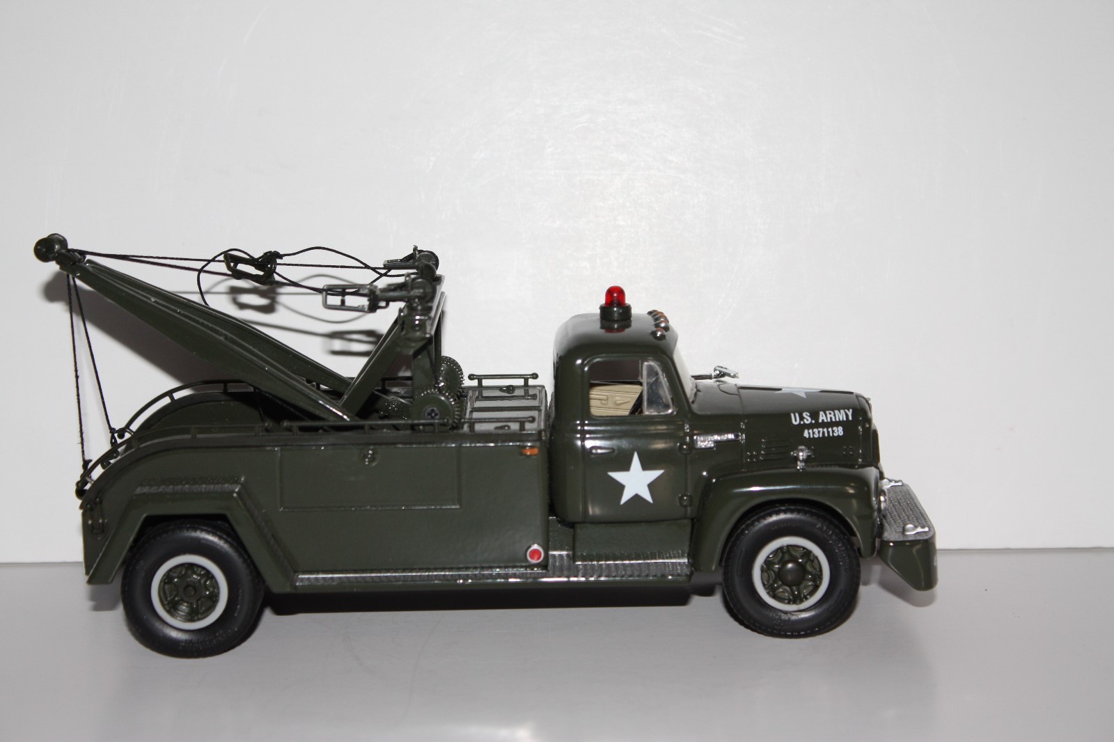 VINTAGE CAST IRON ARMY TOW TRUCK
