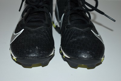 gold and black youth football cleats