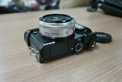 Nikon 1 J5 Mirrorless Digital Camera Black Body with 10mm White Lens Used