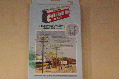 Walthers 933-3101 HO Scale 24 pcs. utility pole kit, ready to assemble.