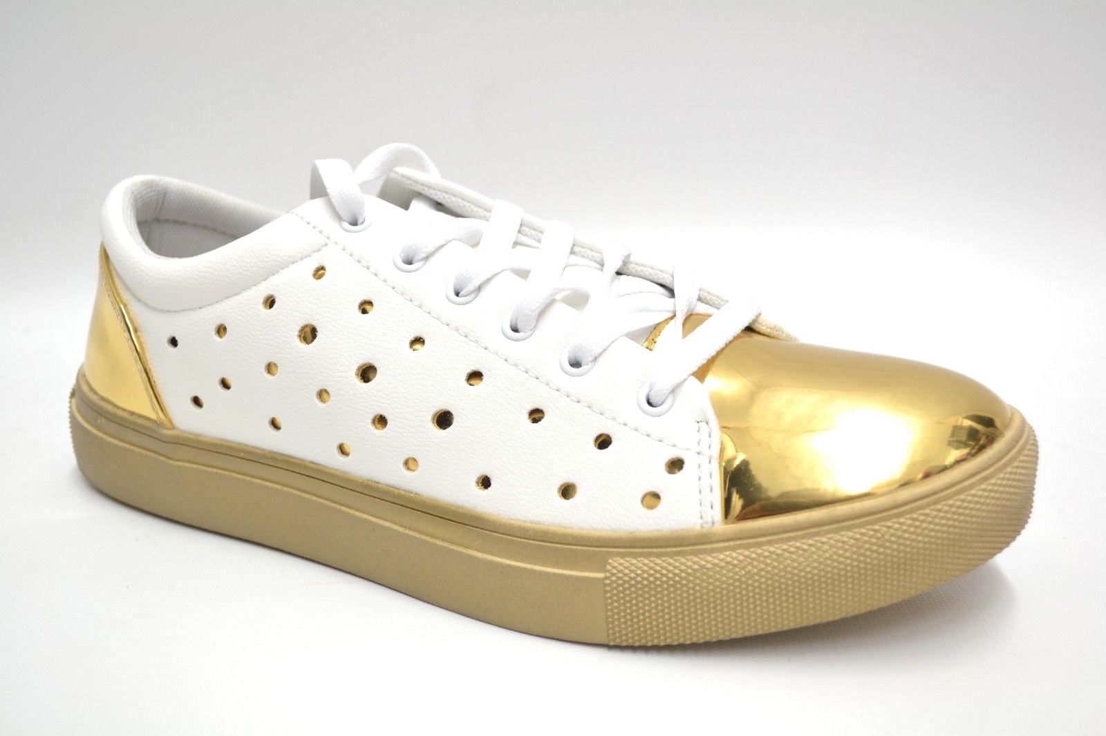 white and gold designer sneakers