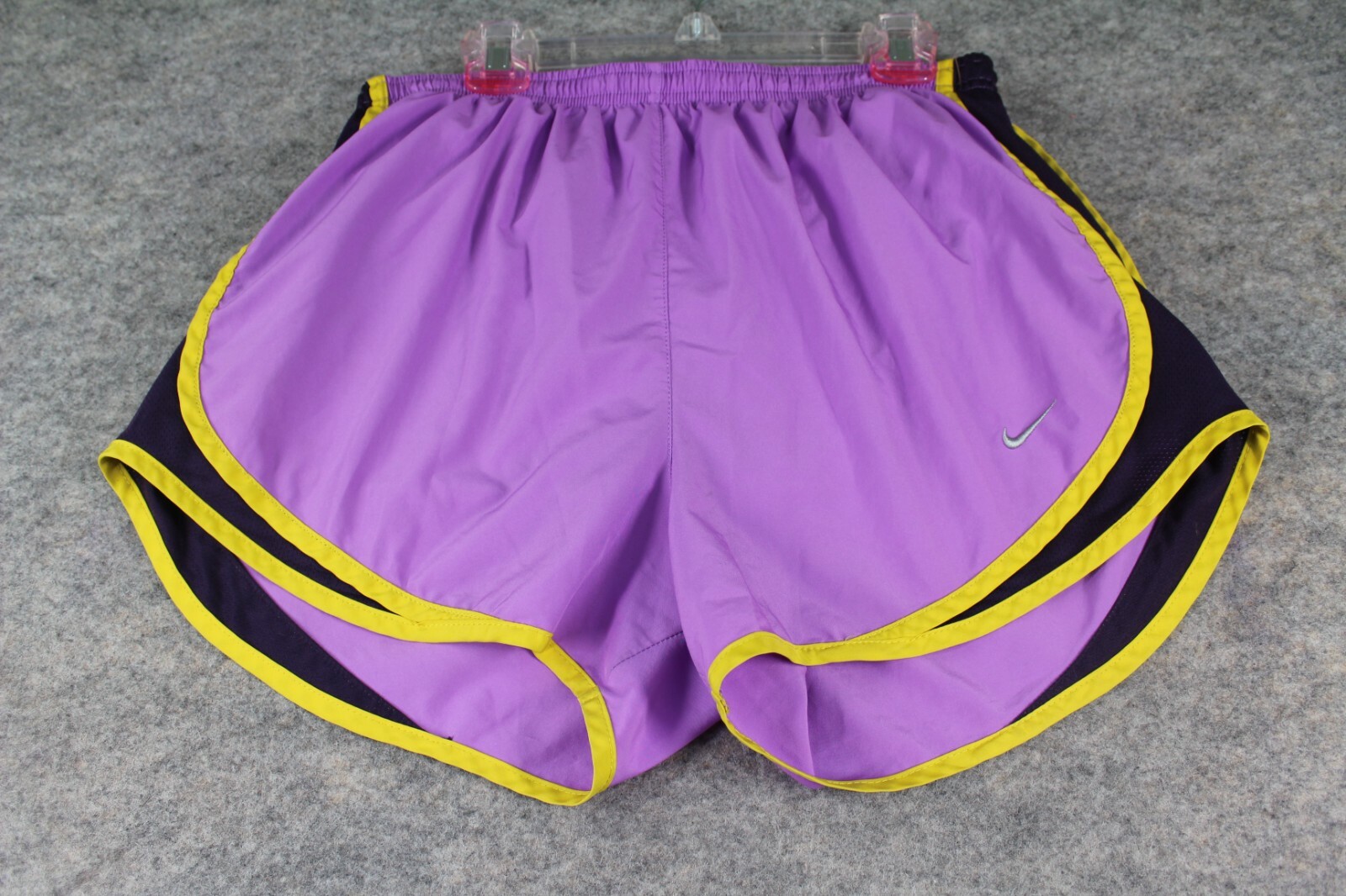purple and yellow nike shorts