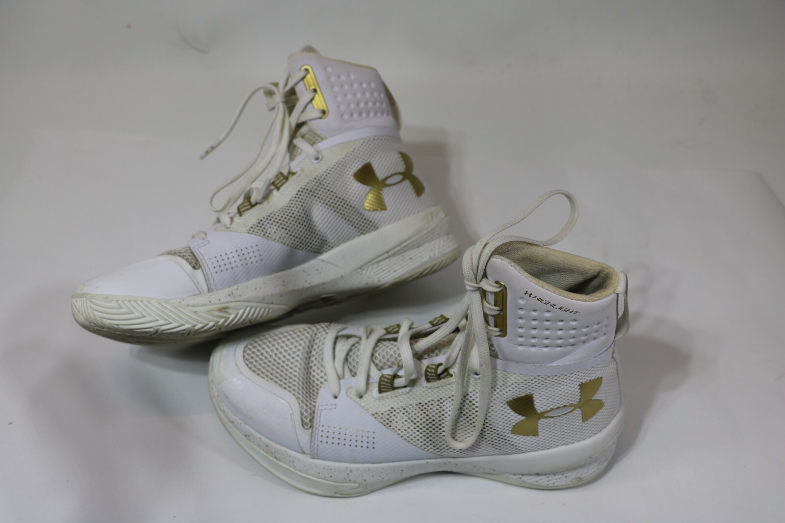 white and gold basketball shoes