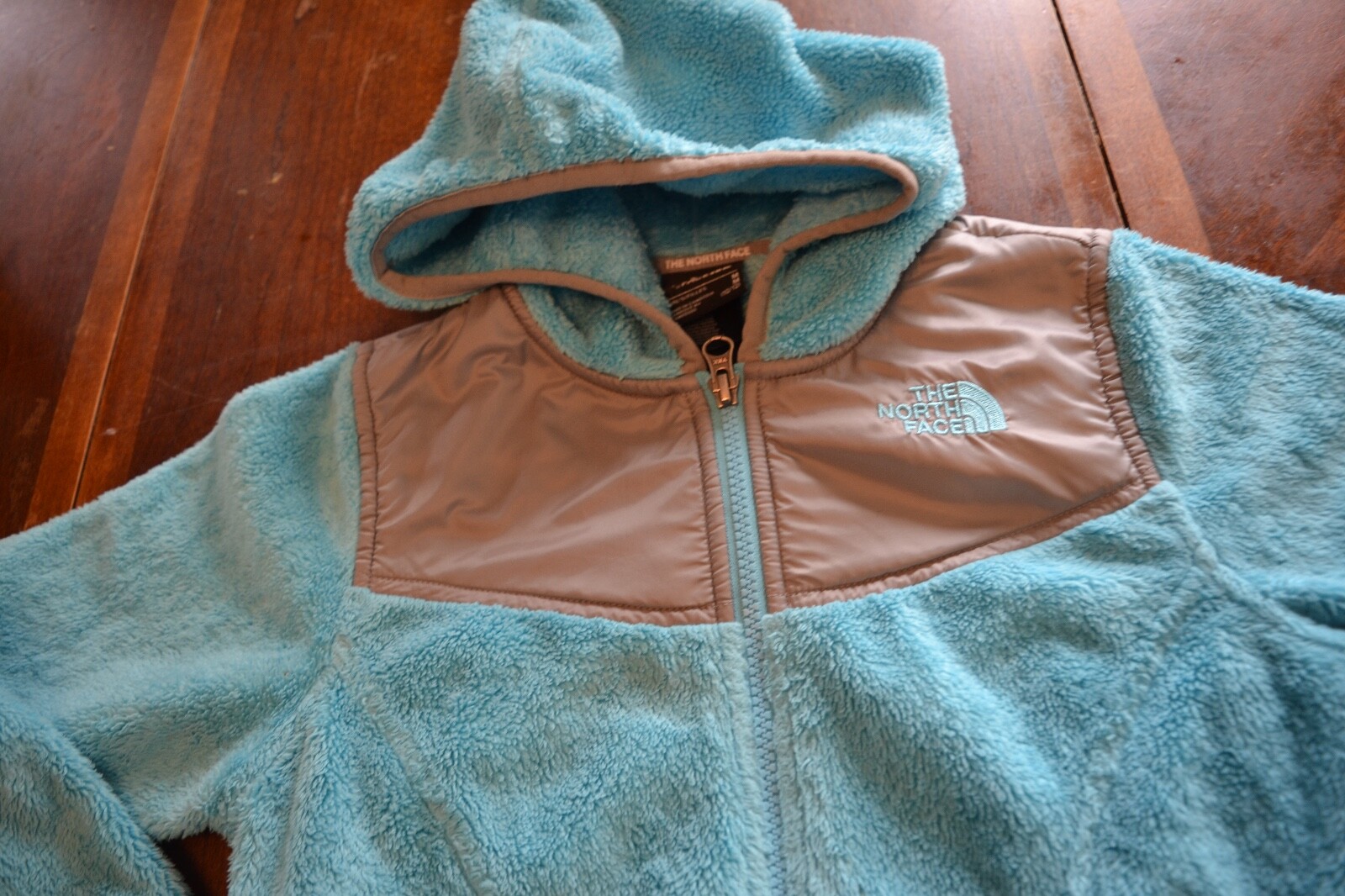 The North Face blue fleece hooded jacket girl's sz M (10/12)