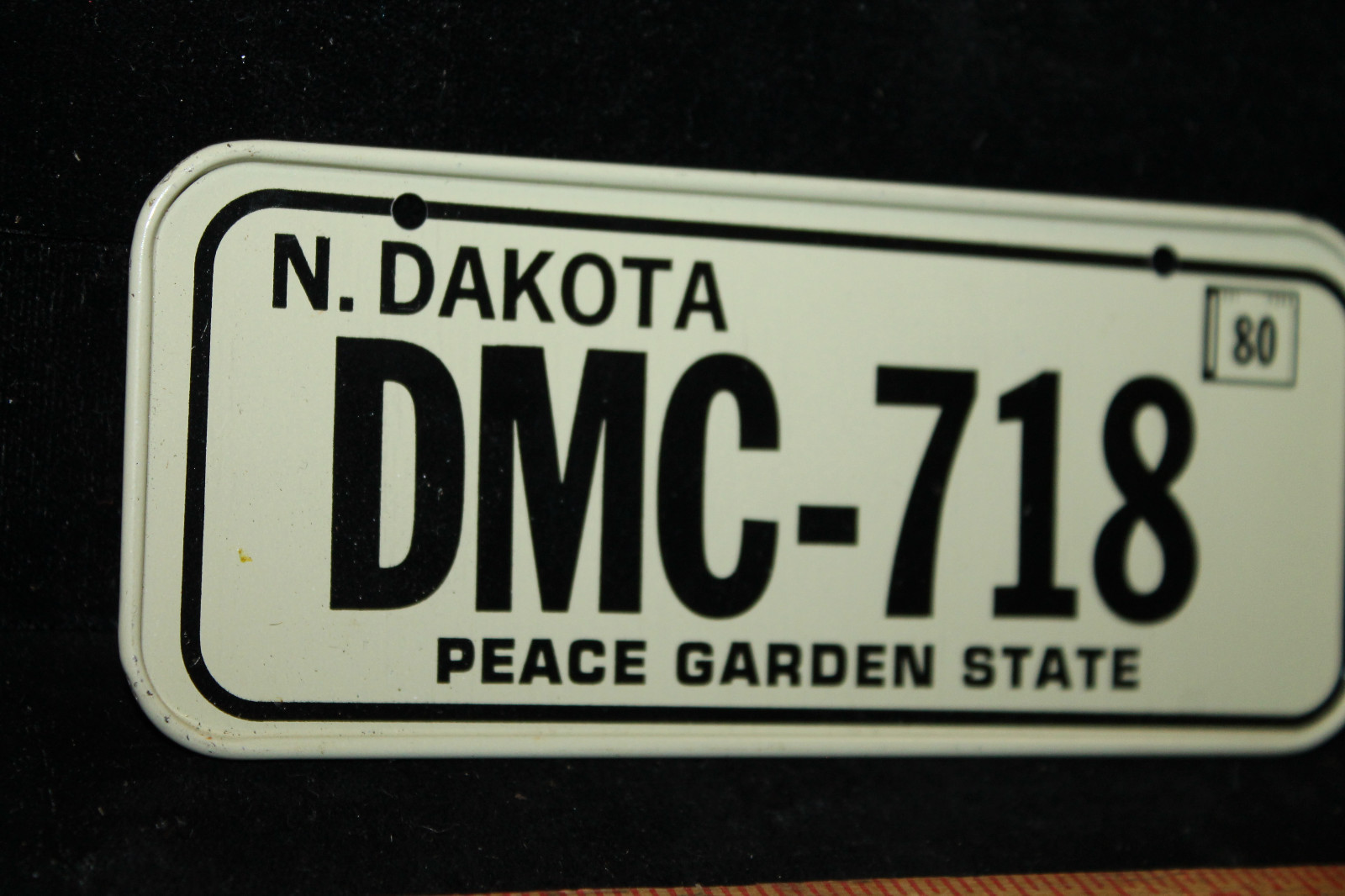 Vintage 1980 N. North Dakota Cereal Mini Bike License Plate #DMC-718 Peace