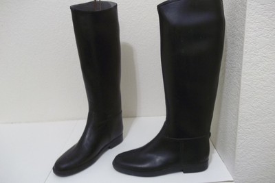 women in rubber riding boots