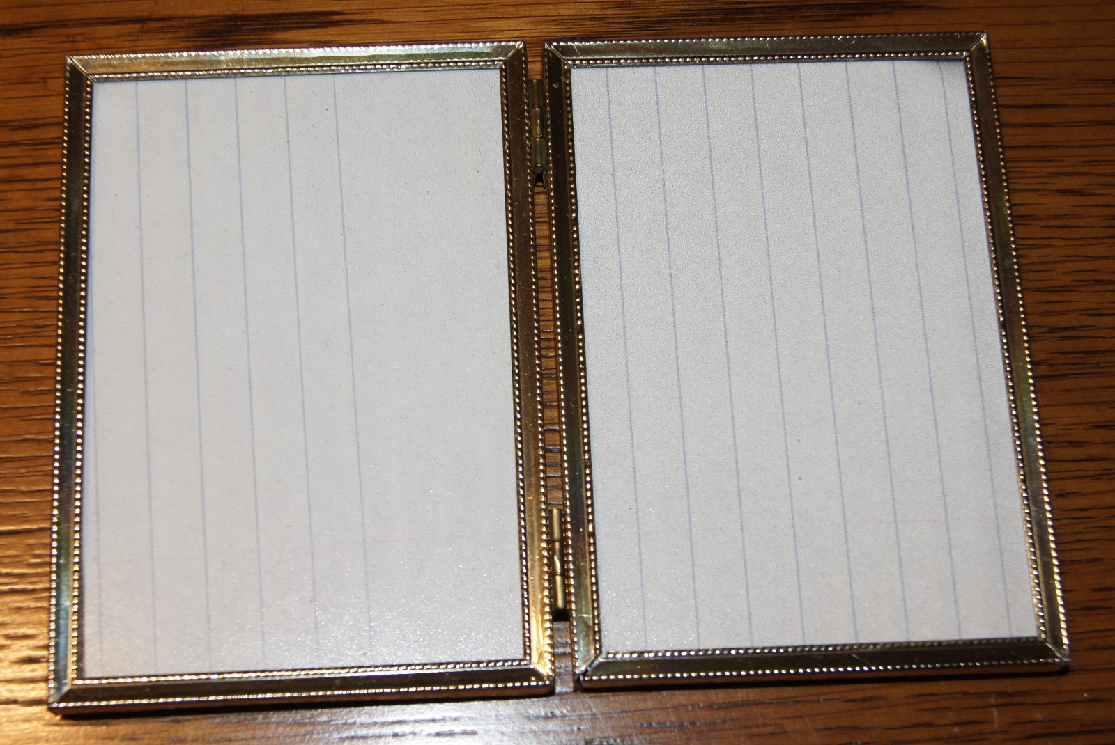 Set of 3 Gold Picture Frames, each hold 2 Pictures