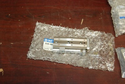 SCM  MXQR8-40AS    Reversible Slide Table,  Air Actuator  New in Bag