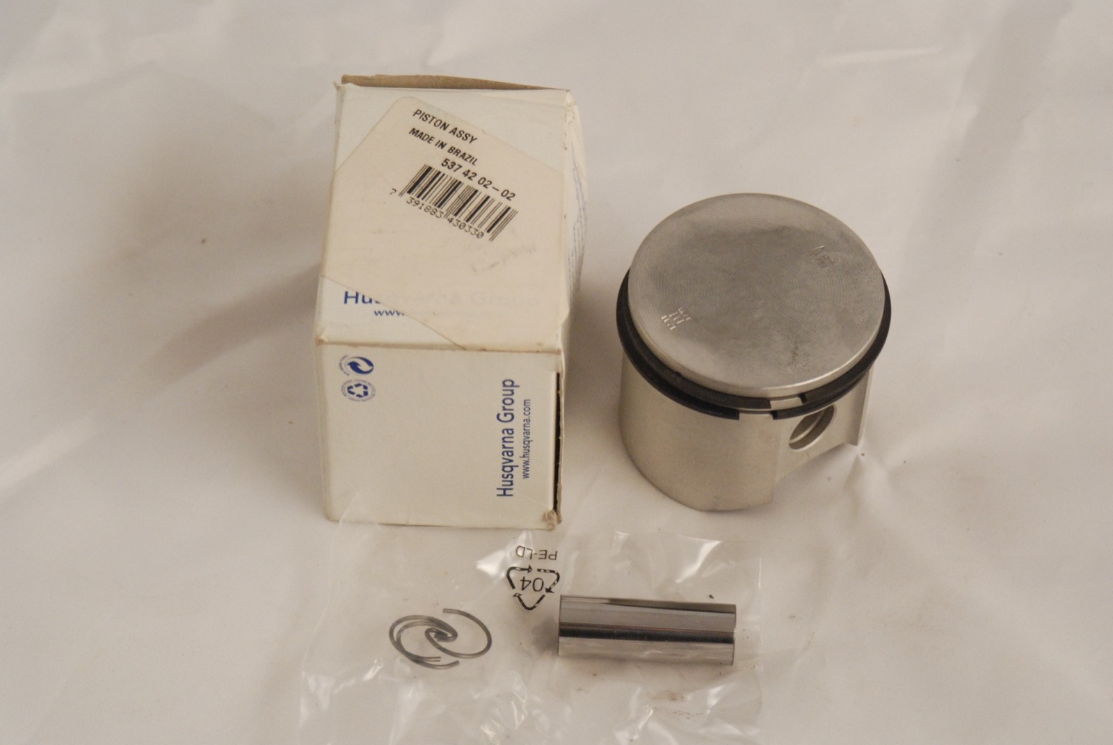 Genuine Husqvarna 390 OEM  Piston Assembly NOS part # 537 42 02-02