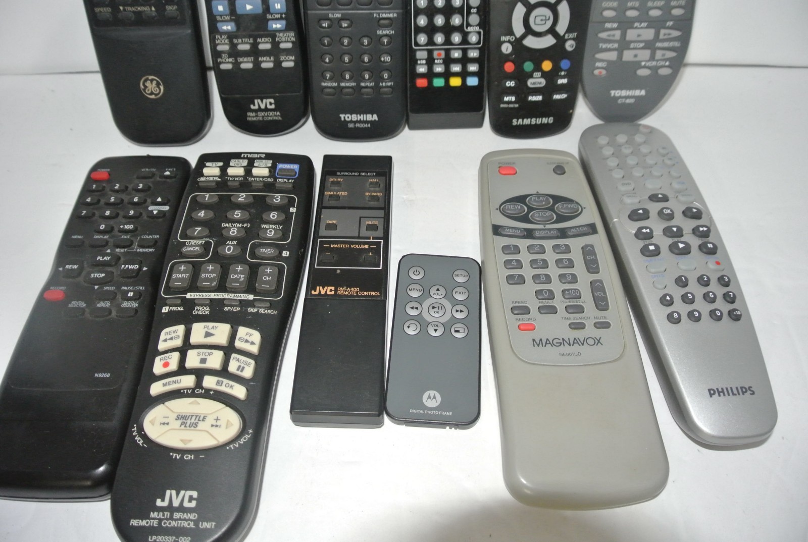 Remote Controls 12 JVC, MOTOROLA, Phillips, SAMSUNG, AND GE AS IS Wholesale Lot