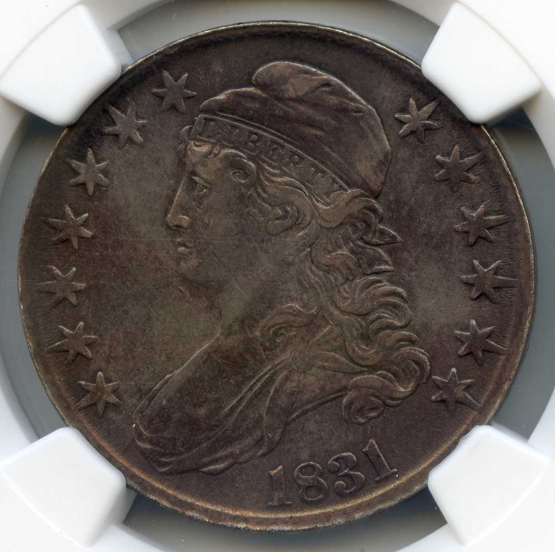 1831 50C Capped Bust Silver Half Dollar. NGC Graded AU - Edge Damage. Lot #2526