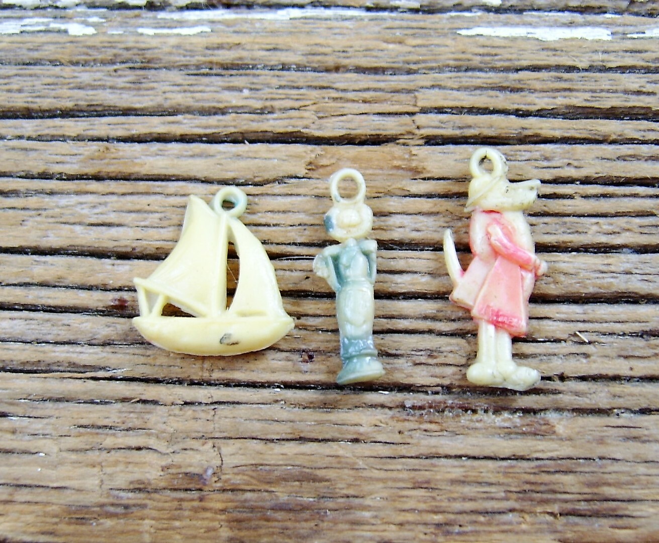 Set of THREE Vintage Celluloid Charms: Lady, Dog in Coat, Sailboat  Two-JAPAN