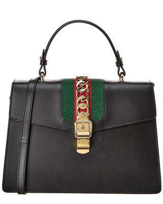 Женская кожаная сумка Gucci Sylvie Medium с верхней ручкой черного цвета