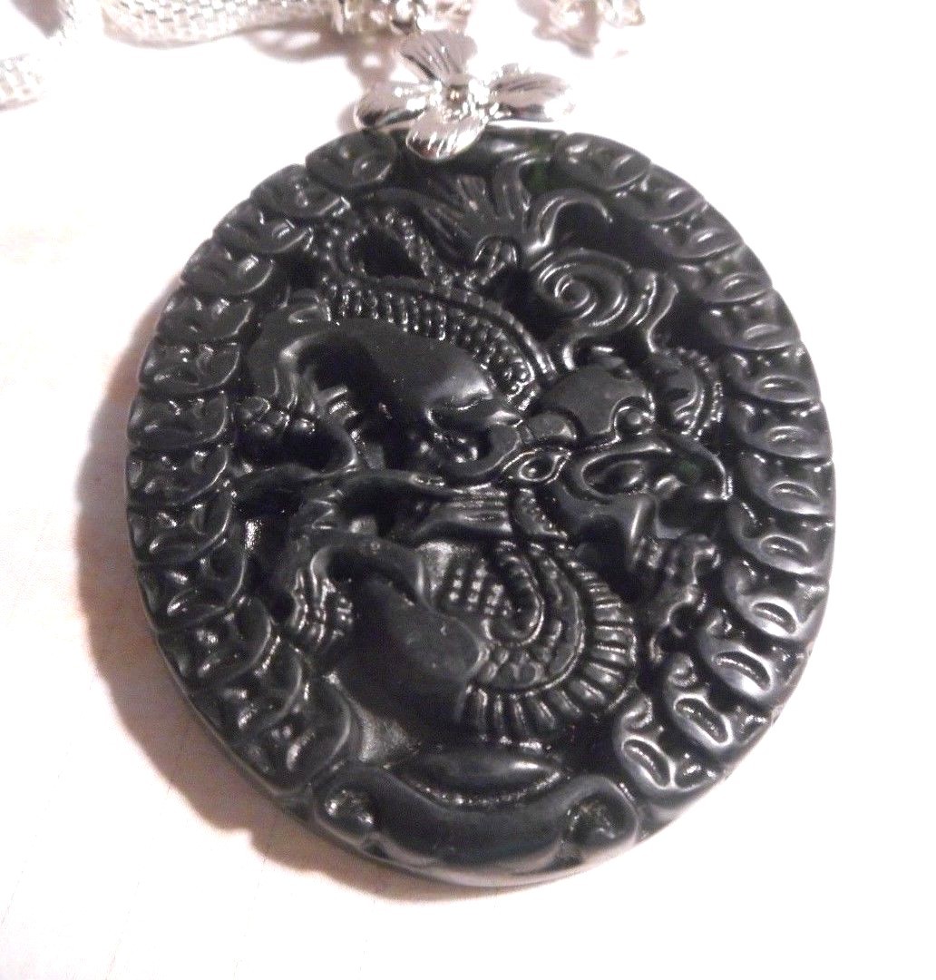 Black natural Artisan made real Jade dragon Chinese pendant on silver chain.