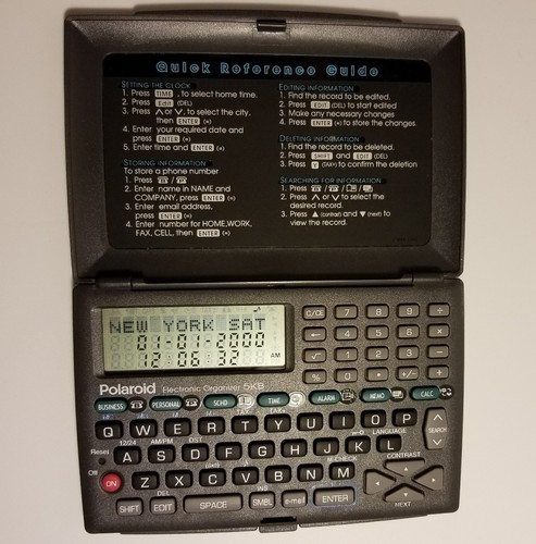 Polaroid Electronic Organizer with Battery & Instruction Manual