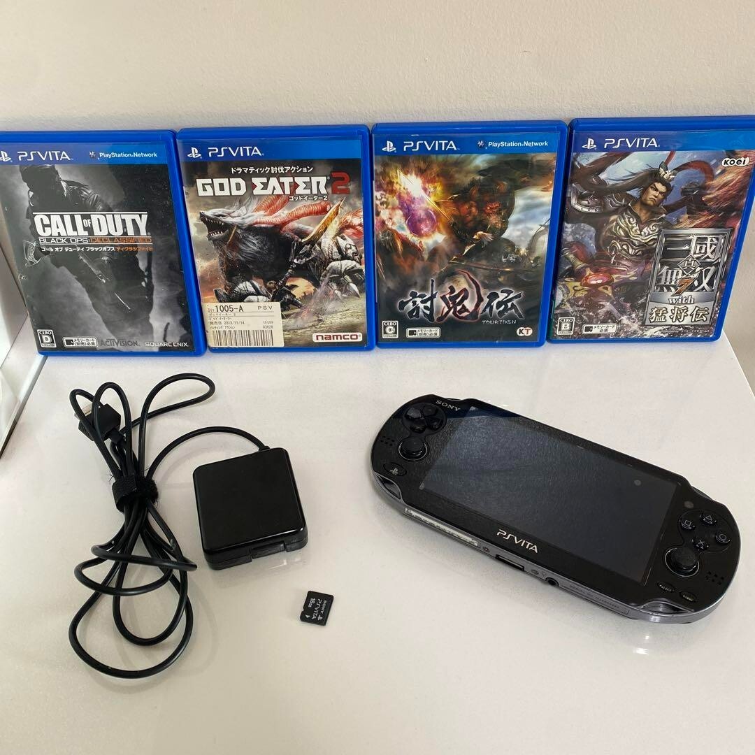 SONY PS Vita PCH-1100 Crystal Black 3G Wi-Fi Model Console + 4