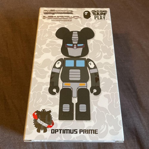 A BATHING APE - BE@RBRICK × TRANSFORMERS  BAPE A BATHING APE®︎ × BE@RBRICK × TRANSFORMERS | bape.com