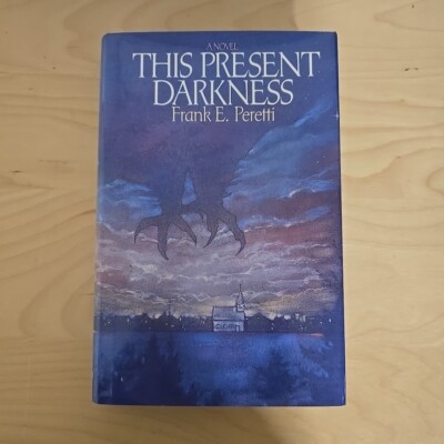 This Present Darkness By Frank E Peretti Hardcover 1990 2nd Printing