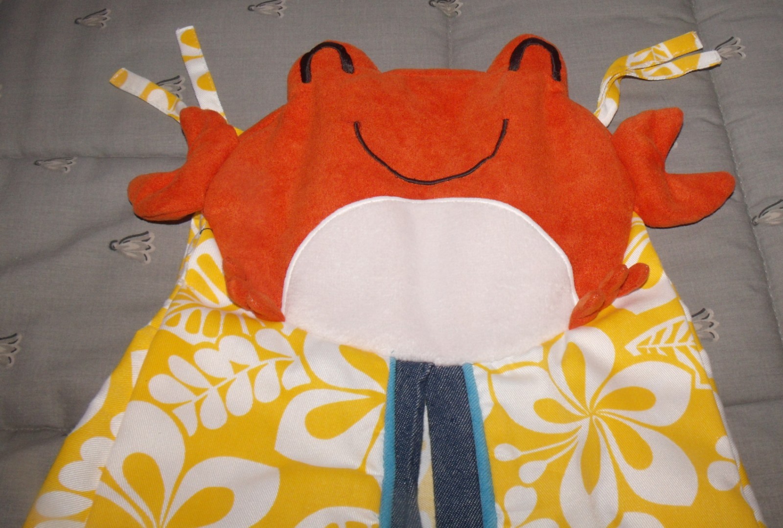 carter's diaper stacker yellow with white flowers and orange and white crab