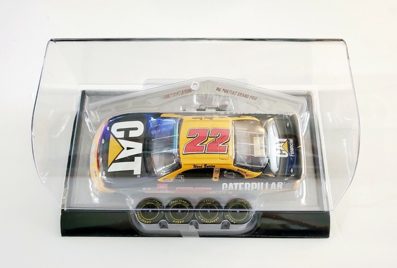 Ward burton Nascar # 22 the Rental store//caterpillar Racing Champions 1:64 Die-cast