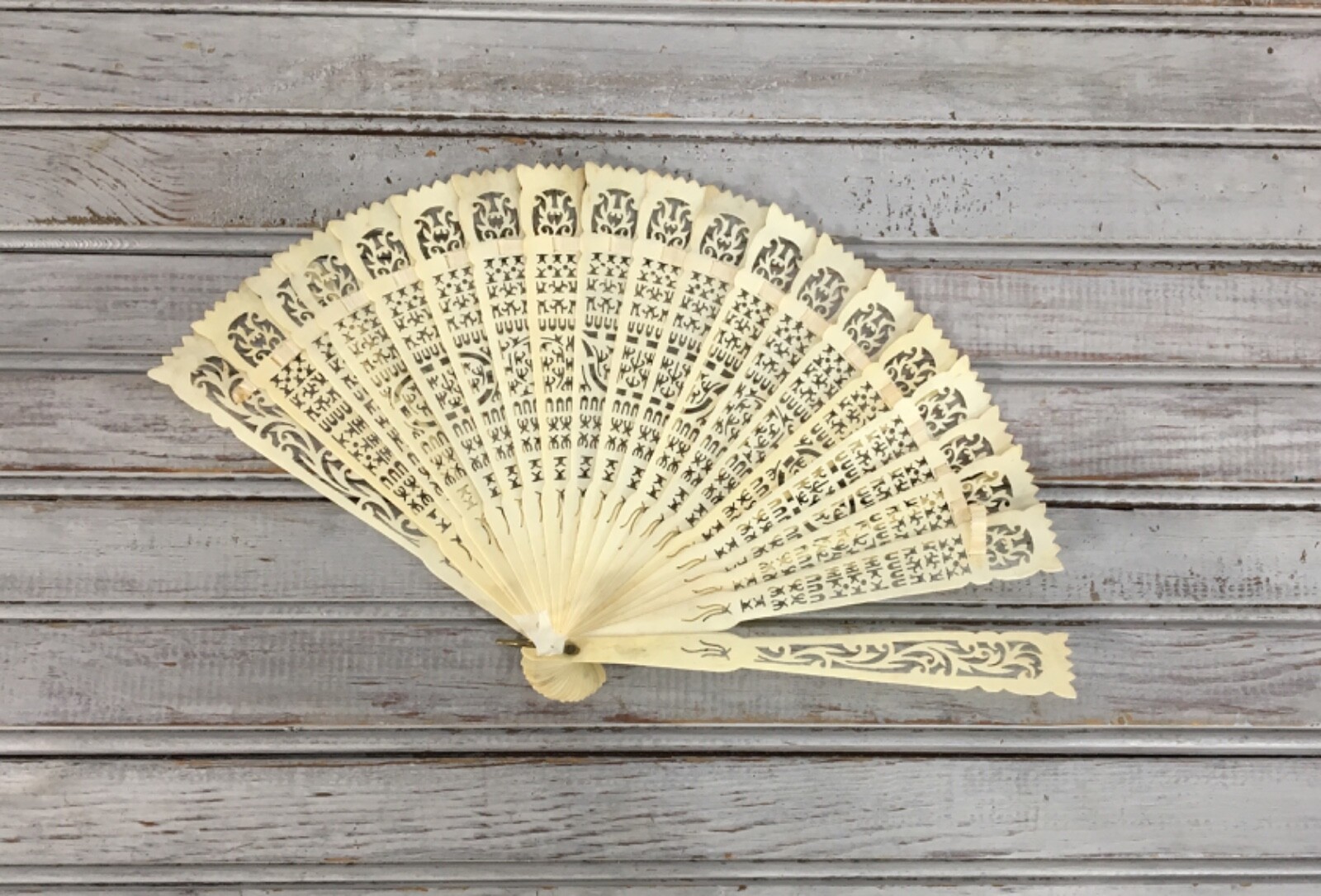Antique Carved Chinese Bone Fan Bovine