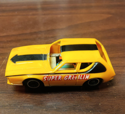 Super Gremlin Tycopro HO Scale Slot Car yellow w/black arrow stripe VG