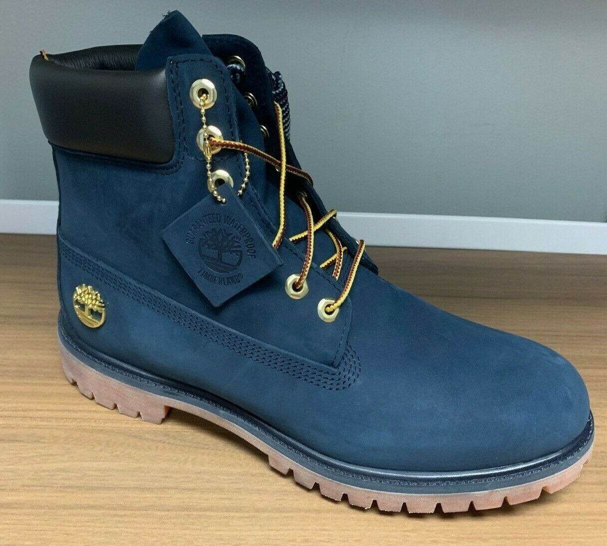 navy blue and gold timberlands