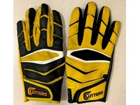 white and yellow football gloves