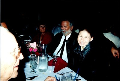 Folks at a party stting at table Found Photo V3253
