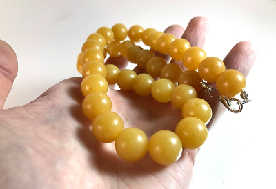 Pressed amber deals beads