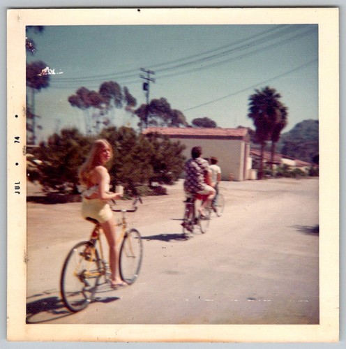 Vtg Color Snapshot Girl Riding Yellow Bicycle Friends Bike Riding Street July