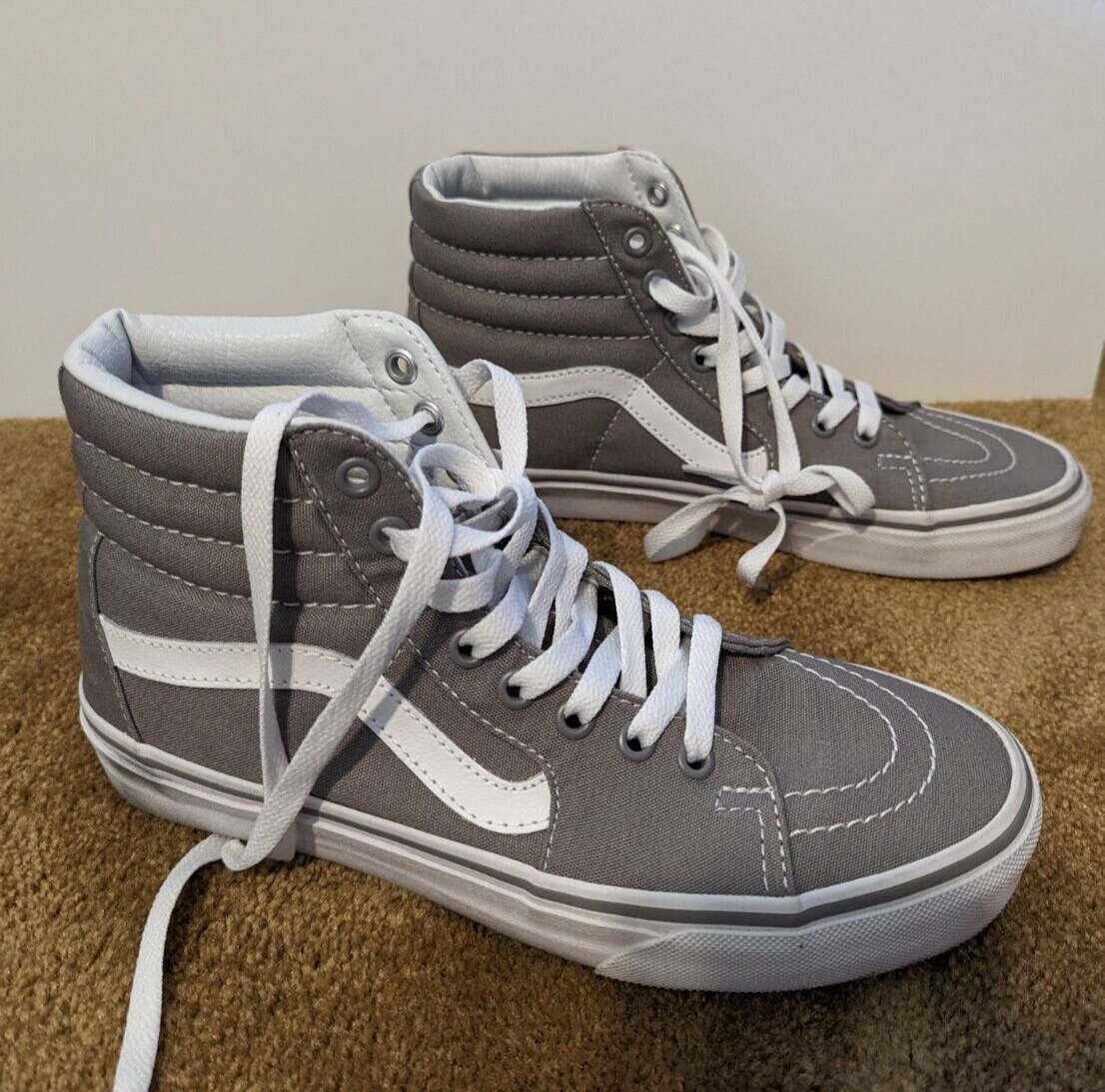 gray and black high top vans