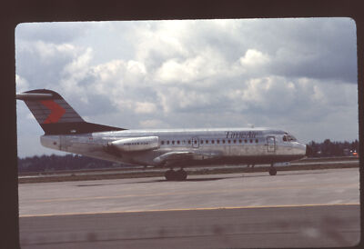 Dupe 35mm airline slide Time Air F28-1000 bare metal C-FTAV