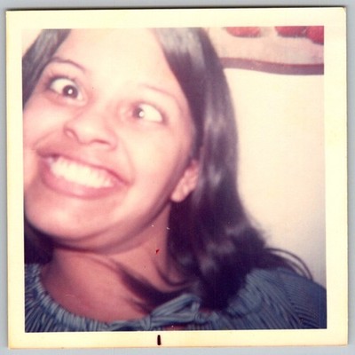 Vtg Color Snapshot Funny Young Woman Making Silly Face Crossed Eyes Smile 1970s