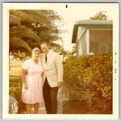 Vtg Color Snapshot Elderly Couple Man Suit Woman Pink Dress House Aug 1970