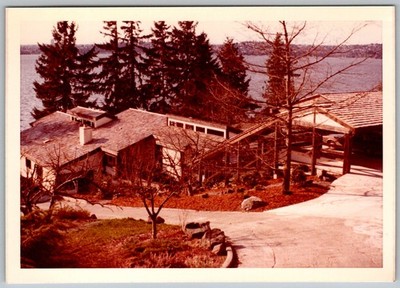 Vtg Color Snapshot Modern Lakefront Home With Carport & Evergreen Trees 1970s