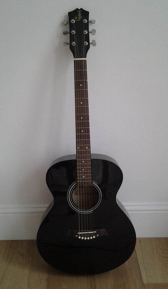 Jack Strings Black Acoustic Guitar, plus several tutors in